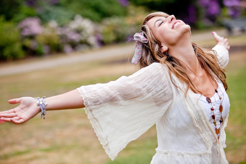 Happy woman with opened arms outdoors enjoy her freedom Happy woman with opened arms outdoors enjoy her freedom
